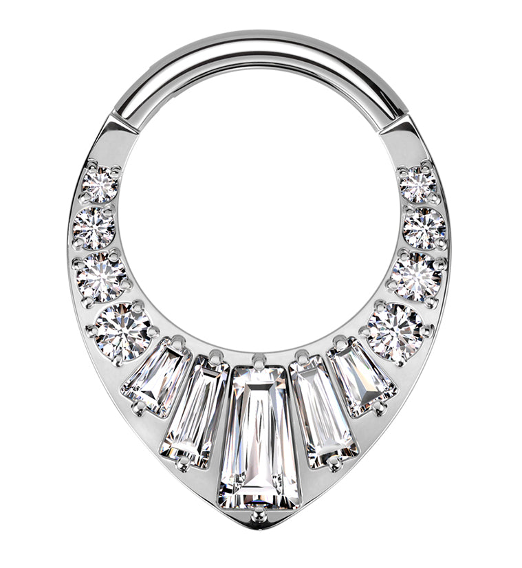 http://www.urbanbodyjewelry.com/cdn/shop/files/point-baguette-clear-cz-titanium-hinged-segment-ring.jpg?v=1690919550