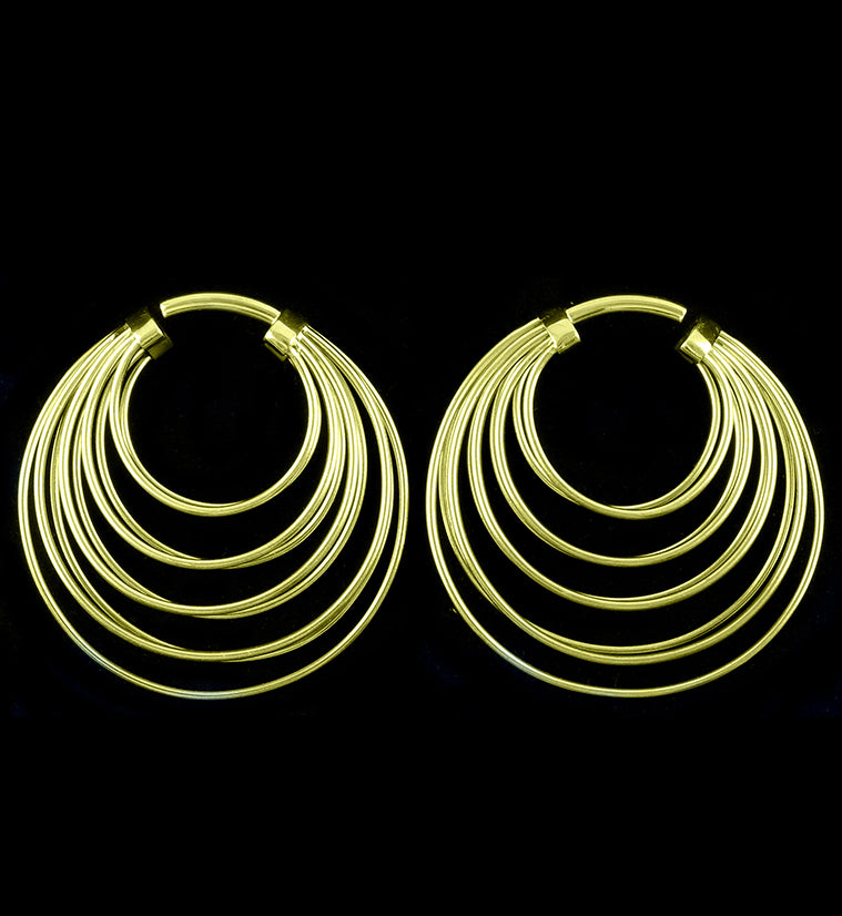 http://www.urbanbodyjewelry.com/cdn/shop/products/multi-hoop-gold-ear-weights.jpg?v=1609165856