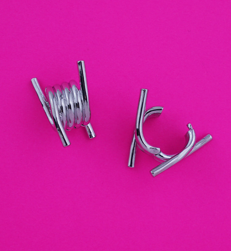 https://www.urbanbodyjewelry.com/cdn/shop/files/barbed-wire-hinged-ear-hangers-3_800x.jpg?v=1691620472